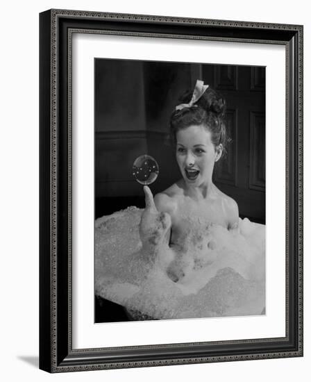 Actress Jeanne Crain Taking Bubble Bath for Her Role in Movie "Margie"-Peter Stackpole-Framed Premium Photographic Print