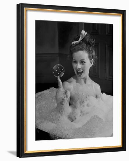 Actress Jeanne Crain Taking Bubble Bath for Her Role in Movie "Margie"-Peter Stackpole-Framed Premium Photographic Print