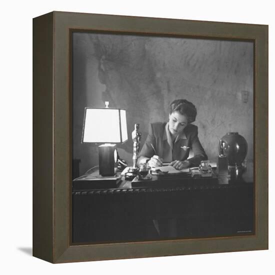 Actress Joan Fontaine Doing the Household Bookkeeping Next to Oscar Statuette-Bob Landry-Framed Premier Image Canvas
