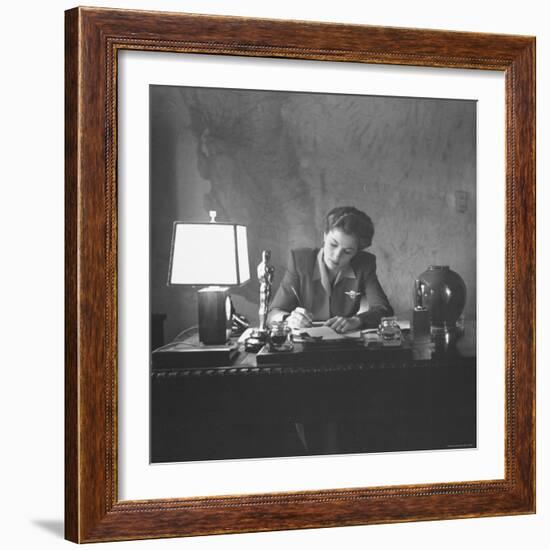 Actress Joan Fontaine Doing the Household Bookkeeping Next to Oscar Statuette-Bob Landry-Framed Premium Photographic Print