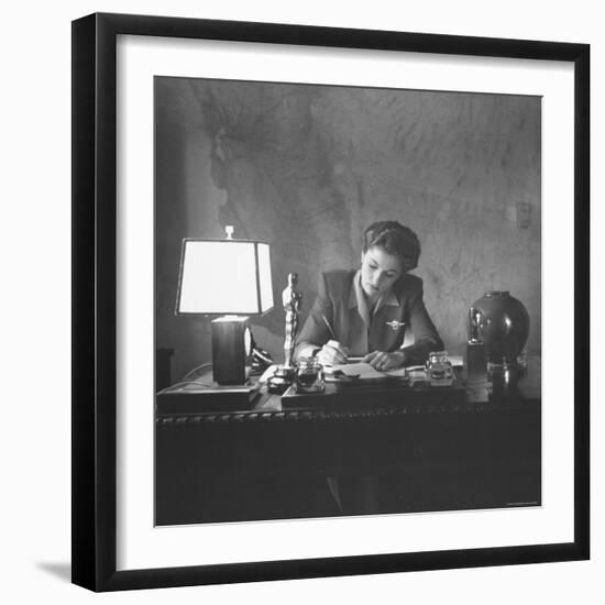 Actress Joan Fontaine Doing the Household Bookkeeping Next to Oscar Statuette-Bob Landry-Framed Premium Photographic Print
