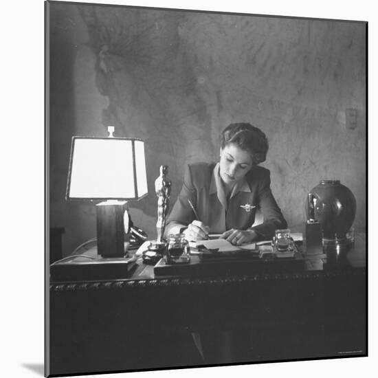 Actress Joan Fontaine Doing the Household Bookkeeping Next to Oscar Statuette-Bob Landry-Mounted Premium Photographic Print