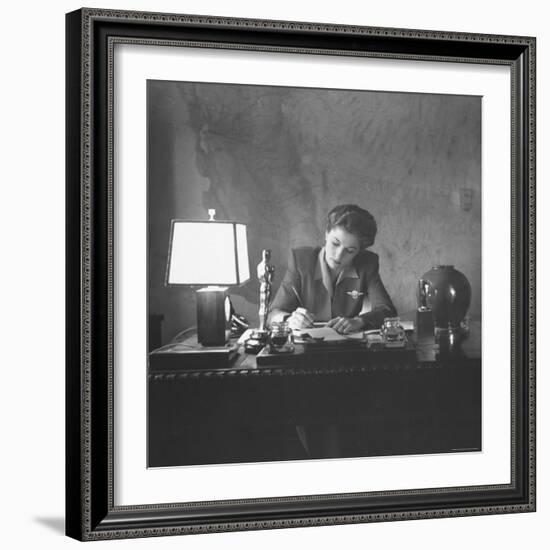 Actress Joan Fontaine Doing the Household Bookkeeping Next to Oscar Statuette-Bob Landry-Framed Premium Photographic Print