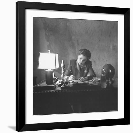 Actress Joan Fontaine Doing the Household Bookkeeping Next to Oscar Statuette-Bob Landry-Framed Premium Photographic Print