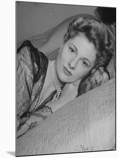 Actress Joan Fontaine Wearing Sheer Negligee While Lounging on Bed at Home-Bob Landry-Mounted Premium Photographic Print