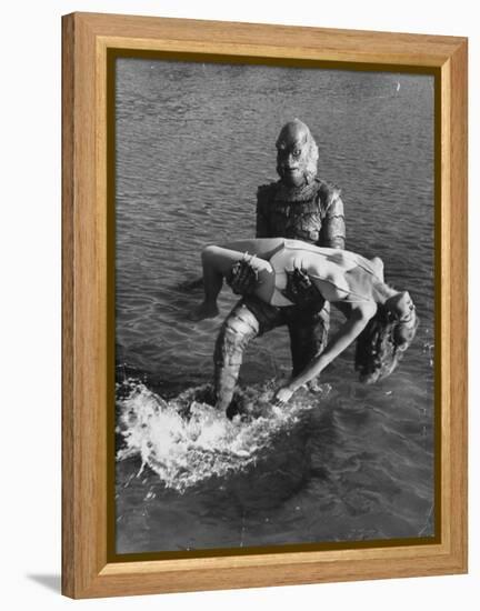 Actress Julia Adams is Carried by Monster, Gill Man, in the Movie, Creature from the Black Lagoon-Ed Clark-Framed Premier Image Canvas