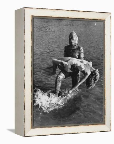 Actress Julia Adams is Carried by Monster, Gill Man, in the Movie, Creature from the Black Lagoon-Ed Clark-Framed Premier Image Canvas