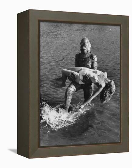 Actress Julia Adams is Carried by Monster, Gill Man, in the Movie, Creature from the Black Lagoon-Ed Clark-Framed Premier Image Canvas