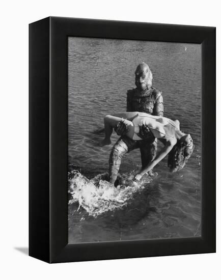 Actress Julia Adams is Carried by Monster, Gill Man, in the Movie, Creature from the Black Lagoon-Ed Clark-Framed Premier Image Canvas