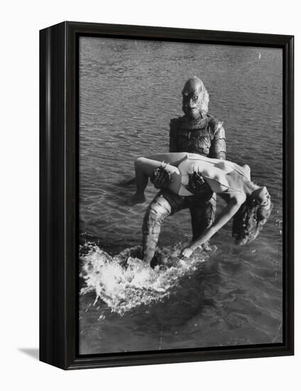 Actress Julia Adams is Carried by Monster, Gill Man, in the Movie, Creature from the Black Lagoon-Ed Clark-Framed Premier Image Canvas