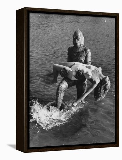 Actress Julia Adams is Carried by Monster, Gill Man, in the Movie, Creature from the Black Lagoon-Ed Clark-Framed Premier Image Canvas