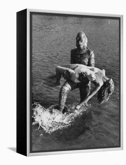 Actress Julia Adams is Carried by Monster, Gill Man, in the Movie, Creature from the Black Lagoon-Ed Clark-Framed Premier Image Canvas