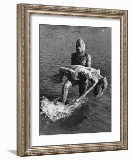 Actress Julia Adams is Carried by Monster, Gill Man, in the Movie, Creature from the Black Lagoon-Ed Clark-Framed Premium Photographic Print