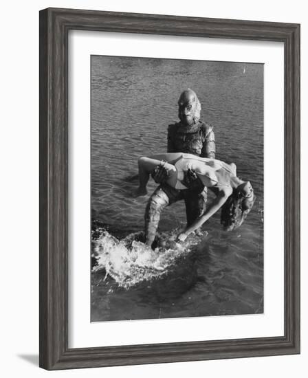 Actress Julia Adams is Carried by Monster, Gill Man, in the Movie, Creature from the Black Lagoon-Ed Clark-Framed Premium Photographic Print