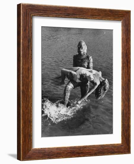 Actress Julia Adams is Carried by Monster, Gill Man, in the Movie, Creature from the Black Lagoon-Ed Clark-Framed Premium Photographic Print