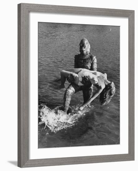 Actress Julia Adams is Carried by Monster, Gill Man, in the Movie, Creature from the Black Lagoon-Ed Clark-Framed Premium Photographic Print