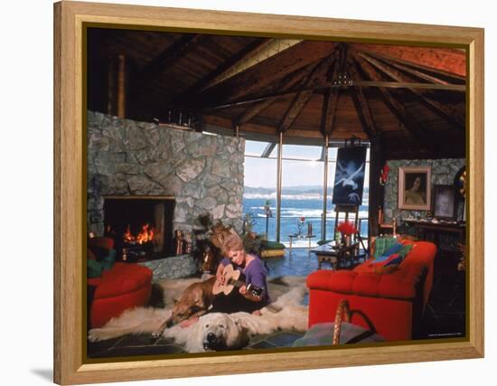 Actress Kim Novak Playing Guitar Beside Pet Great Dane Warlock at Her Home in Big Sur-Eliot Elisofon-Framed Premier Image Canvas