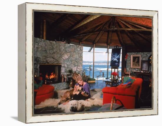 Actress Kim Novak Playing Guitar Beside Pet Great Dane Warlock at Her Home in Big Sur-Eliot Elisofon-Framed Premier Image Canvas