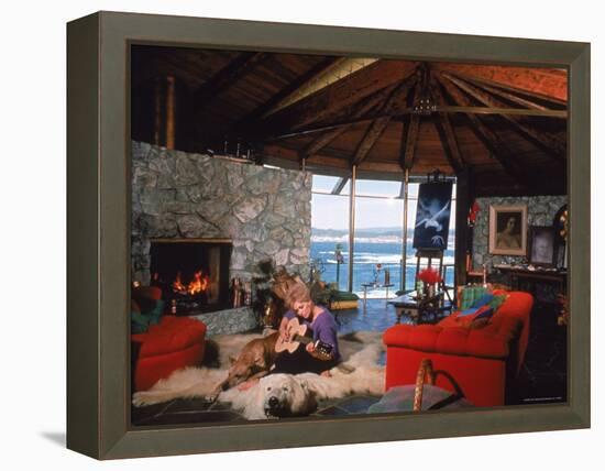 Actress Kim Novak Playing Guitar Beside Pet Great Dane Warlock at Her Home in Big Sur-Eliot Elisofon-Framed Premier Image Canvas