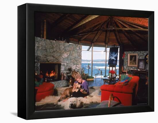 Actress Kim Novak Playing Guitar Beside Pet Great Dane Warlock at Her Home in Big Sur-Eliot Elisofon-Framed Premier Image Canvas