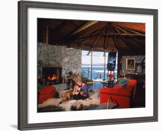 Actress Kim Novak Playing Guitar Beside Pet Great Dane Warlock at Her Home in Big Sur-Eliot Elisofon-Framed Premium Photographic Print