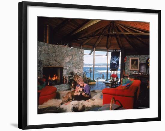 Actress Kim Novak Playing Guitar Beside Pet Great Dane Warlock at Her Home in Big Sur-Eliot Elisofon-Framed Premium Photographic Print