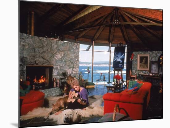 Actress Kim Novak Playing Guitar Beside Pet Great Dane Warlock at Her Home in Big Sur-Eliot Elisofon-Mounted Premium Photographic Print