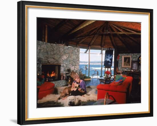 Actress Kim Novak Playing Guitar Beside Pet Great Dane Warlock at Her Home in Big Sur-Eliot Elisofon-Framed Premium Photographic Print