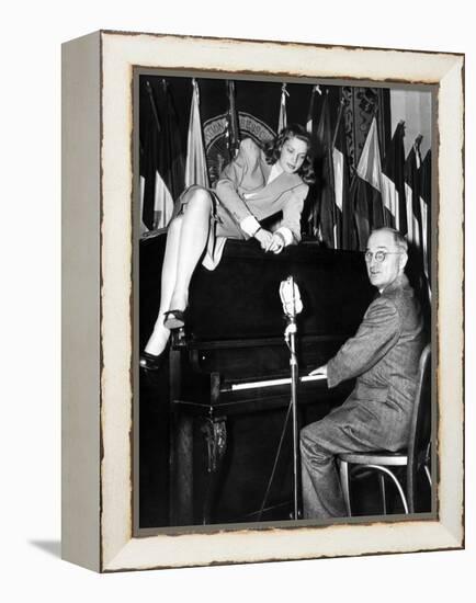 Actress Lauren Bacall Sits Atop the Piano While Vice President Harry Truman Plays-null-Framed Stretched Canvas