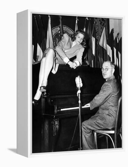 Actress Lauren Bacall Sits Atop the Piano While Vice President Harry Truman Plays-null-Framed Stretched Canvas