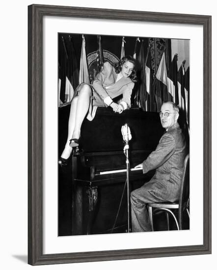 Actress Lauren Bacall Sits Atop the Piano While Vice President Harry Truman Plays-null-Framed Photo