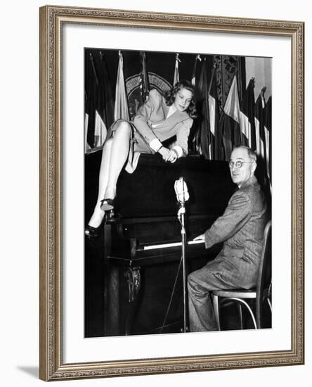 Actress Lauren Bacall Sits Atop the Piano While Vice President Harry Truman Plays-null-Framed Photo