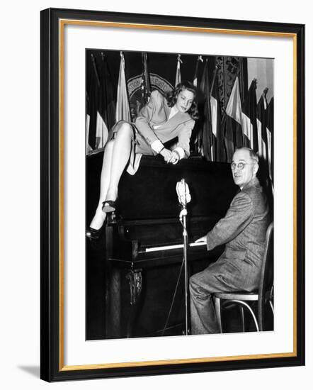 Actress Lauren Bacall Sits Atop the Piano While Vice President Harry Truman Plays-null-Framed Photo