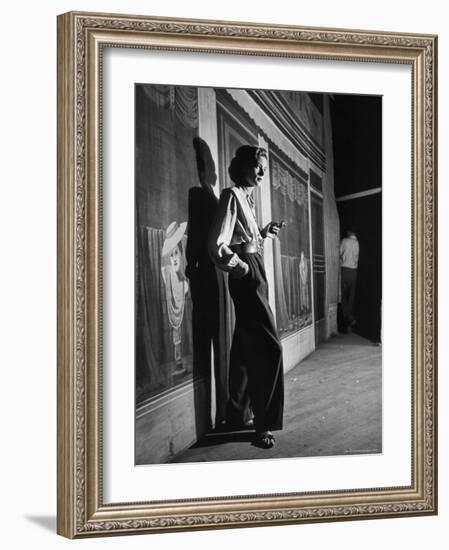 Actress Lauren Bacall Smoking a Cigarette on the Set of Film, "Young Man with a Horn"-Alfred Eisenstaedt-Framed Premium Photographic Print