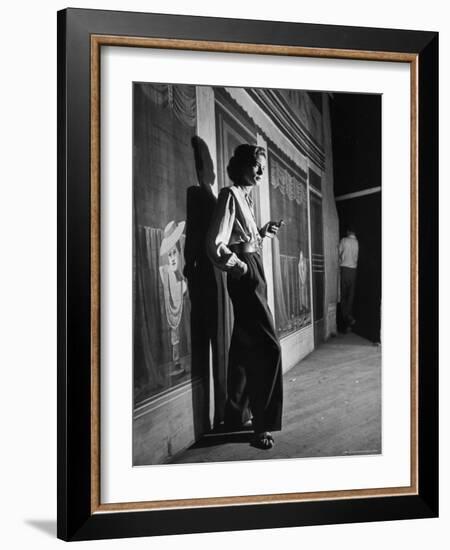 Actress Lauren Bacall Smoking a Cigarette on the Set of Film, "Young Man with a Horn"-Alfred Eisenstaedt-Framed Premium Photographic Print