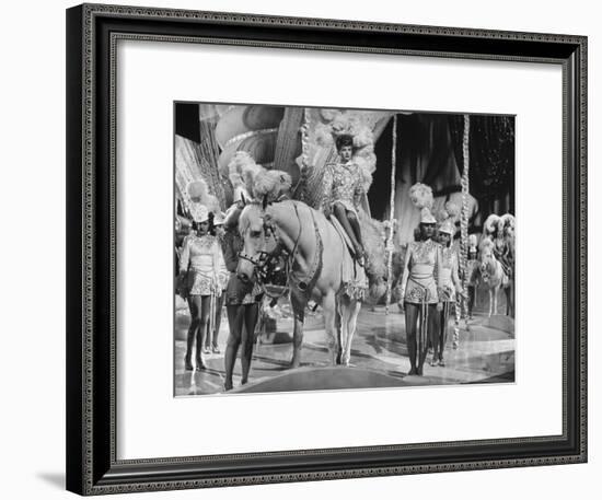 Actress Lucille Ball Performing in a Scene from the Movie "The Ziegfeld Follies"-null-Framed Premium Photographic Print