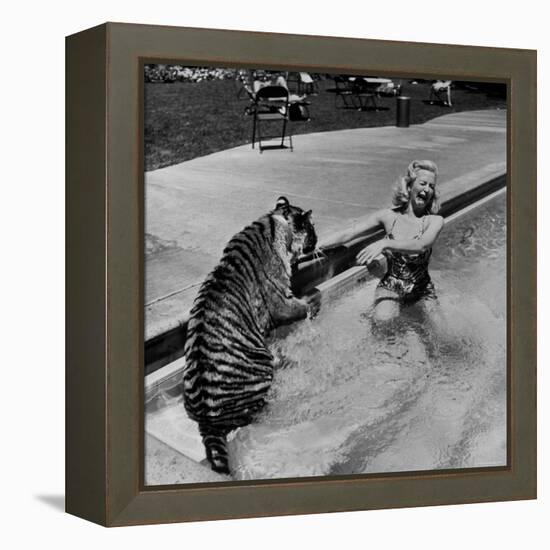 Actress Marilyn Maxwell Playing with a Tiger in a Pool-Allan Grant-Framed Premier Image Canvas