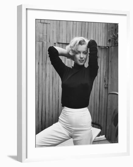 Actress Marilyn Monroe Playfully Elegant, at Home-Alfred Eisenstaedt-Framed Premium Photographic Print