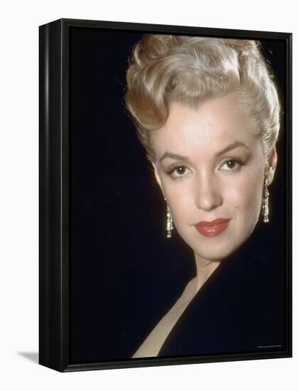 Actress Marilyn Monroe Wearing Dangling Rhinestone Earrings, with Her Hair Up-Ed Clark-Framed Premier Image Canvas