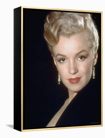 Actress Marilyn Monroe Wearing Dangling Rhinestone Earrings, with Her Hair Up-Ed Clark-Framed Premier Image Canvas