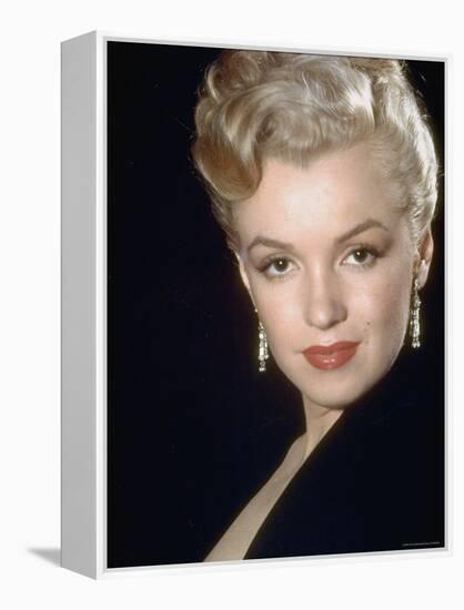 Actress Marilyn Monroe Wearing Dangling Rhinestone Earrings, with Her Hair Up-Ed Clark-Framed Premier Image Canvas