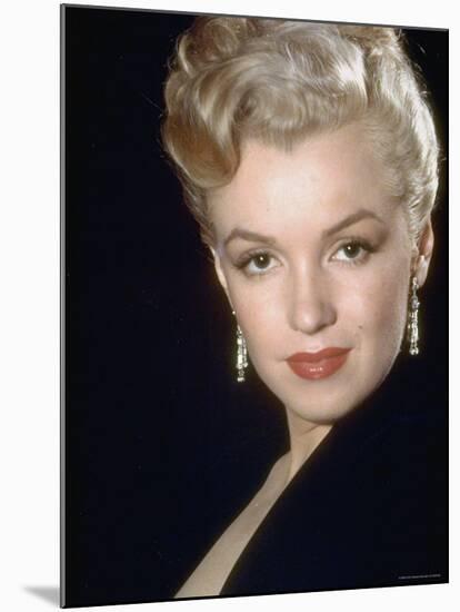 Actress Marilyn Monroe Wearing Dangling Rhinestone Earrings, with Her Hair Up-Ed Clark-Mounted Premium Photographic Print