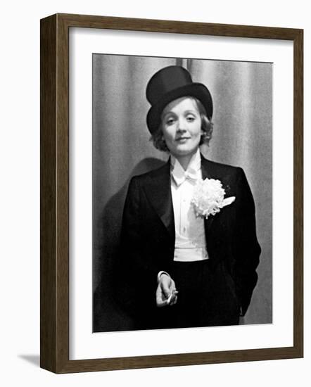 Actress Marlene Dietrich Wearing Tuxedo, Top Hat, and Holding Cigarette at Ball for Foreign Press-Alfred Eisenstaedt-Framed Premium Photographic Print