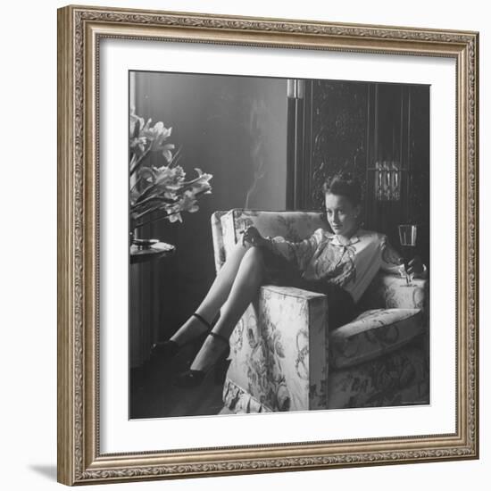 Actress Olivia de Havilland with Cigarette and Glass of Beer in While Relaxing at Home-Bob Landry-Framed Premium Photographic Print