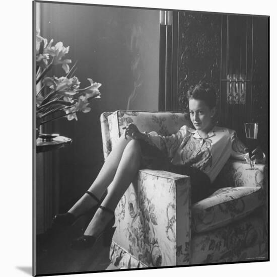 Actress Olivia de Havilland with Cigarette and Glass of Beer in While Relaxing at Home-Bob Landry-Mounted Premium Photographic Print