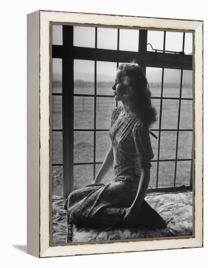 Actress Peggy Cummins Looking Out of a Window-Bob Landry-Framed Premier Image Canvas