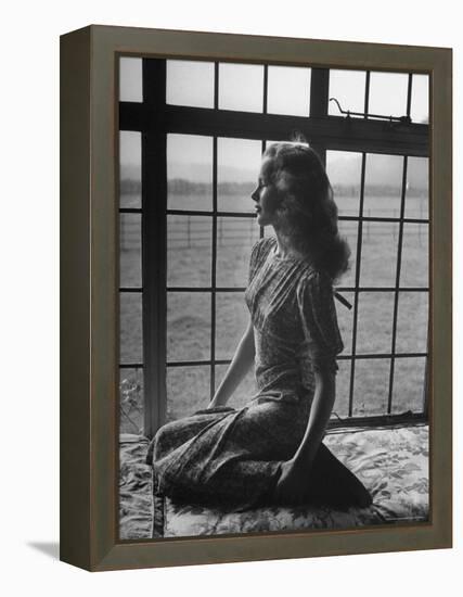 Actress Peggy Cummins Looking Out of a Window-Bob Landry-Framed Premier Image Canvas