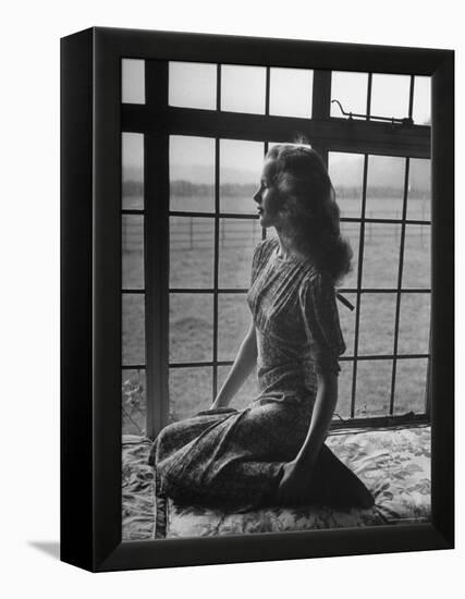 Actress Peggy Cummins Looking Out of a Window-Bob Landry-Framed Premier Image Canvas