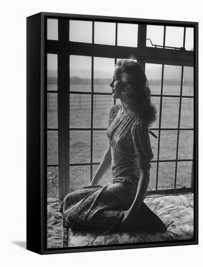 Actress Peggy Cummins Looking Out of a Window-Bob Landry-Framed Premier Image Canvas