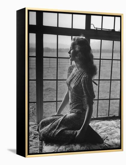 Actress Peggy Cummins Looking Out of a Window-Bob Landry-Framed Premier Image Canvas